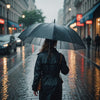 Woman with umbrella in rain, representing staying dry during ovulation.